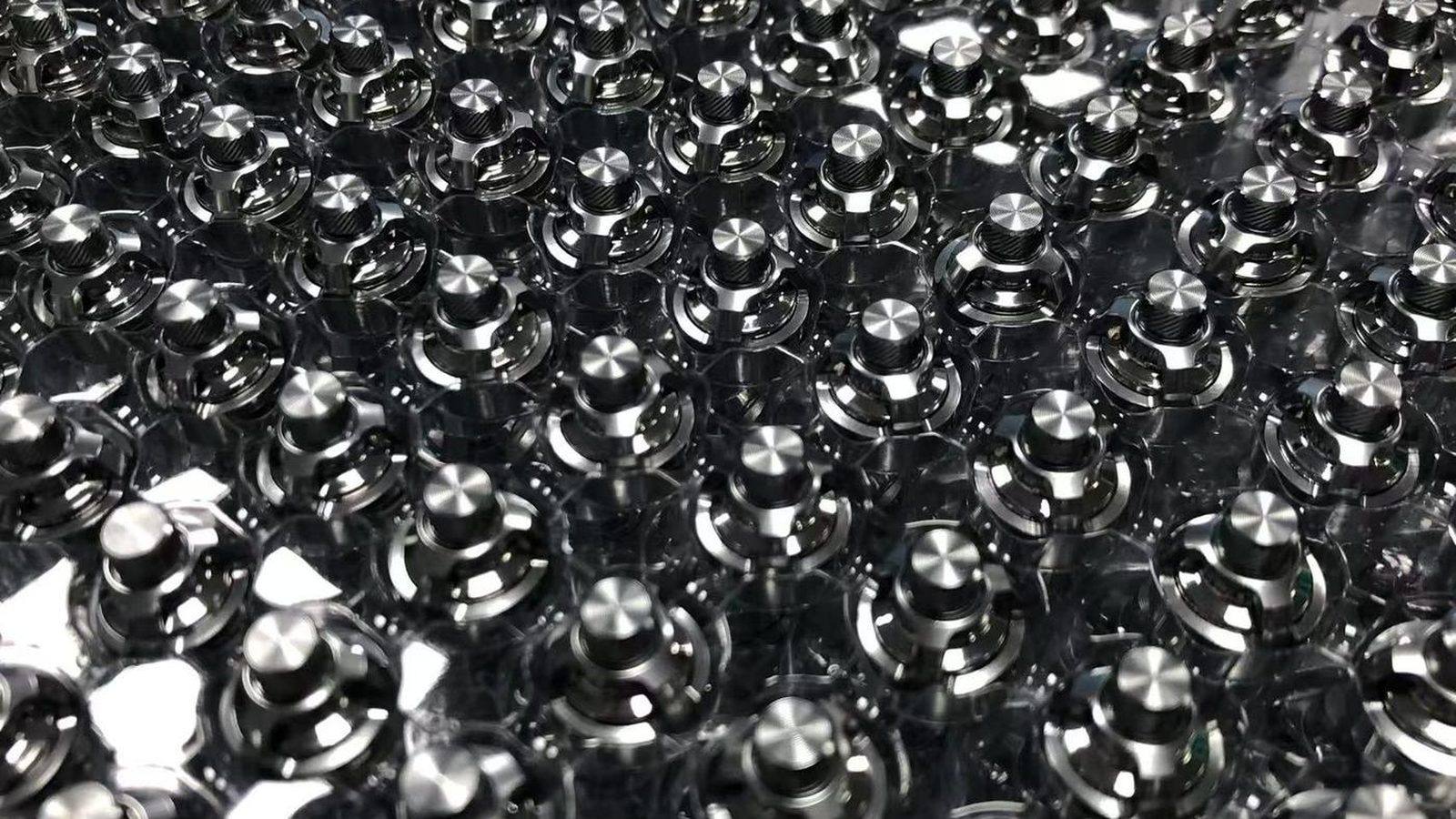 Custom CNC machined precision metal parts produced in batch at Goldencube's workshop